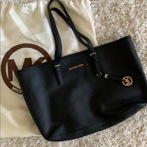 Authentic. MK jet set tote